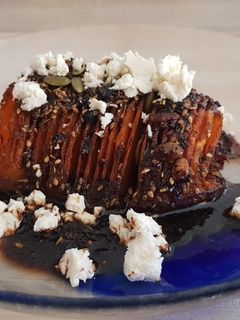 Una foto de Calabaza hasselback