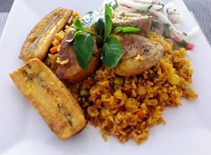 Una foto de Lomo de Cerdo (Pork) con arroz a la Jardinera a lo Carmelita