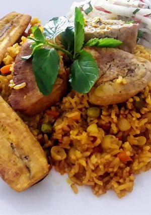 Una foto de Lomo de Cerdo (Pork) con arroz a la Jardinera a lo Carmelita