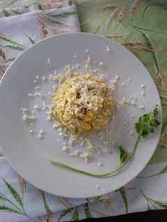 Una foto de Huevos a la mantequilla con queso