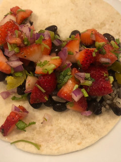 A picture of Black bean tacos with strawberry salsa.