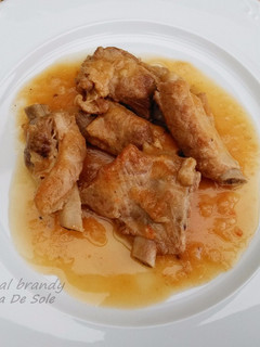Una foto de Costillas al brandy