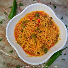 A picture of Palm oil Indomie noodles jollof.