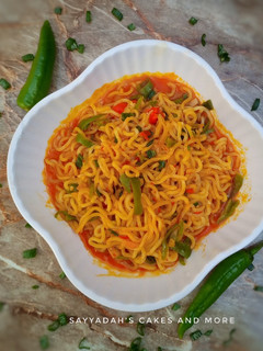A picture of Palm oil Indomie noodles jollof.
