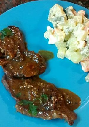 Una foto de Carne bien picante al vino tinto