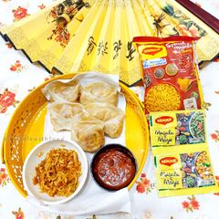 A picture of Maggi Momos with garlic chutney.