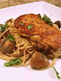Crispy chicken thigh with angel hair, mushroom and garlic butter cilantro sauce