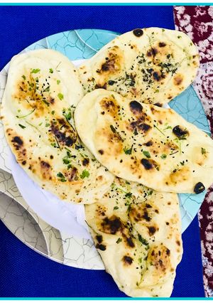 A picture of Kulche /garlic butter naan.