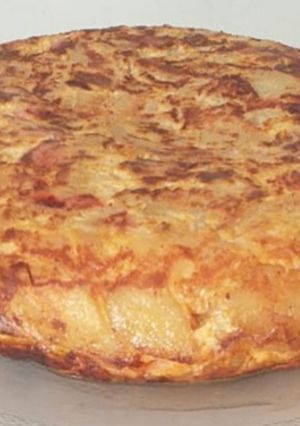 Una foto de Tortilla de papa Rellena