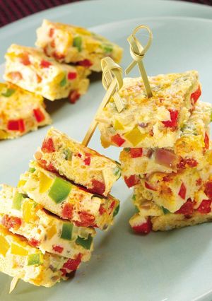 Una foto de Tortilla de verduras y canónigos