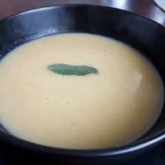 A picture of Parsnip and white bean soup with sage.