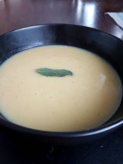 A picture of Parsnip and white bean soup with sage.