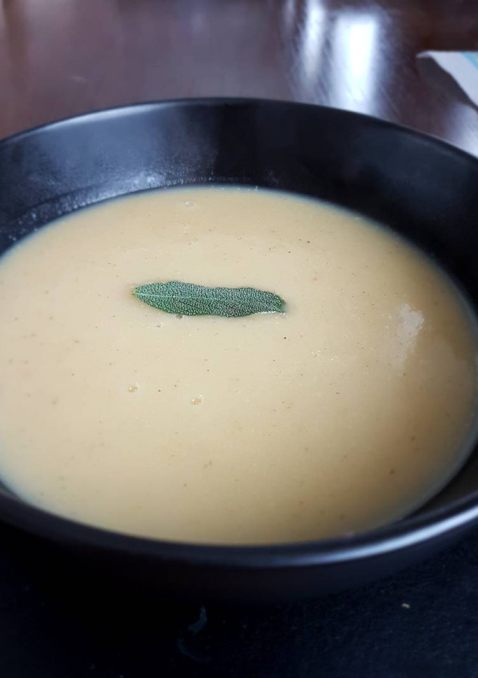A picture of Parsnip and white bean soup with sage.