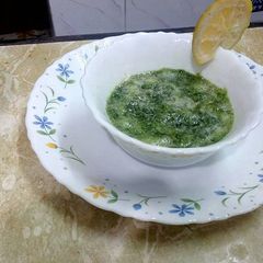 A picture of Coriander chutney with musambi.