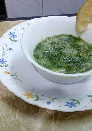A picture of Coriander chutney with musambi.