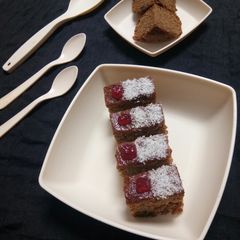 A picture of Wheat Flour Custard Coconut Cake Bars.