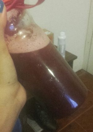 Una foto de Licuado de naranja frutilla arándano