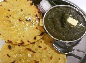 A picture of Makki ki roti aur sarson ka saag.