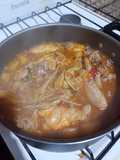 Fideos con tuco y pollo