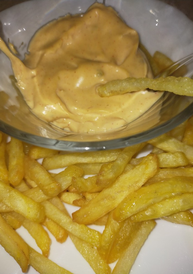 Una foto de Salsa de queso muy parecida a la del burger