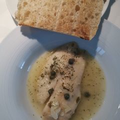 A picture of Fish in White Wine Sauce.