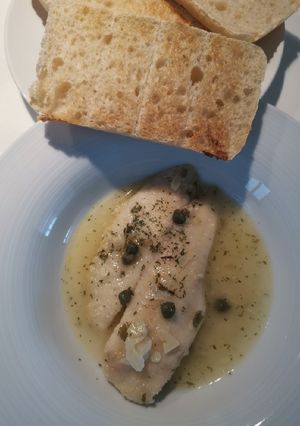 A picture of Fish in White Wine Sauce.