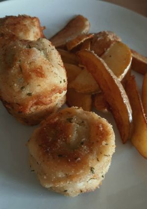 Una foto de Rollito de pollo relleno de queso de cabra y pimiento verde