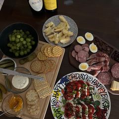 A picture of Classic Charcuterie Board & Caprese Salad.