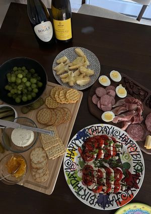 A picture of Classic Charcuterie Board & Caprese Salad.