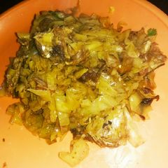 A picture of Cabbage with rohufish head.