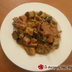 A picture of Eggplants with beef in the oven.