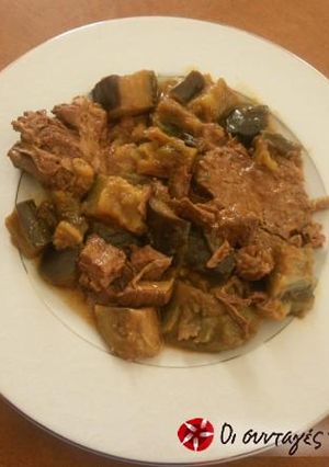 A picture of Eggplants with beef in the oven.