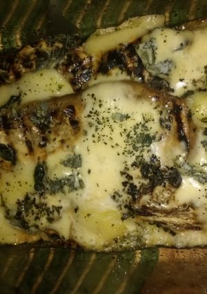 Una foto de Berenjena y cebolla al horno con quesos y crema
