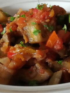 Una foto de Berenjenas con Tomate