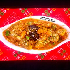 A picture of Katiyawadi Undhiyu - Red Gravy Undhiyu - Gujarati Cuisine.