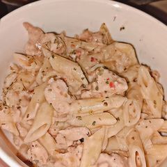 A picture of Penne Alfredo pasta.