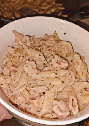 A picture of Penne Alfredo pasta.