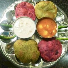 A picture of BeetRoot Spinach Poori Sabzi.