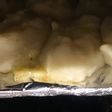 Papitas falsas rellenas con queso al horno con salsa de romero