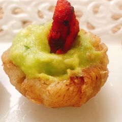 A picture of Plantain Baskets Topped with Guacamole & Chicken Tikka.
