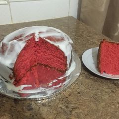 A picture of Semi- naked colored Vanilla cake.