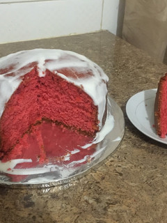 A picture of Semi- naked colored Vanilla cake.