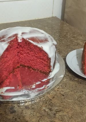 A picture of Semi- naked colored Vanilla cake.