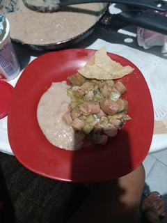 Una foto de Salchicha en salsa verde con papa y champiñones