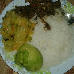 A picture of Boiled rice,wet fry beef and steamed cabbage and Avocado.