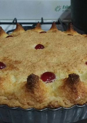 Una foto de Tarta de coco, membrillo y dulce de leche