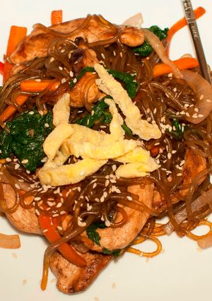 A picture of Japchae with Grilled Marinated Chicken.