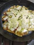 Zuchinis al horno con muzzarella y pesto