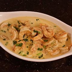 A picture of Poached Shrimp in a Lemon Cream Broth.