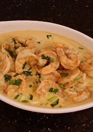 A picture of Poached Shrimp in a Lemon Cream Broth.